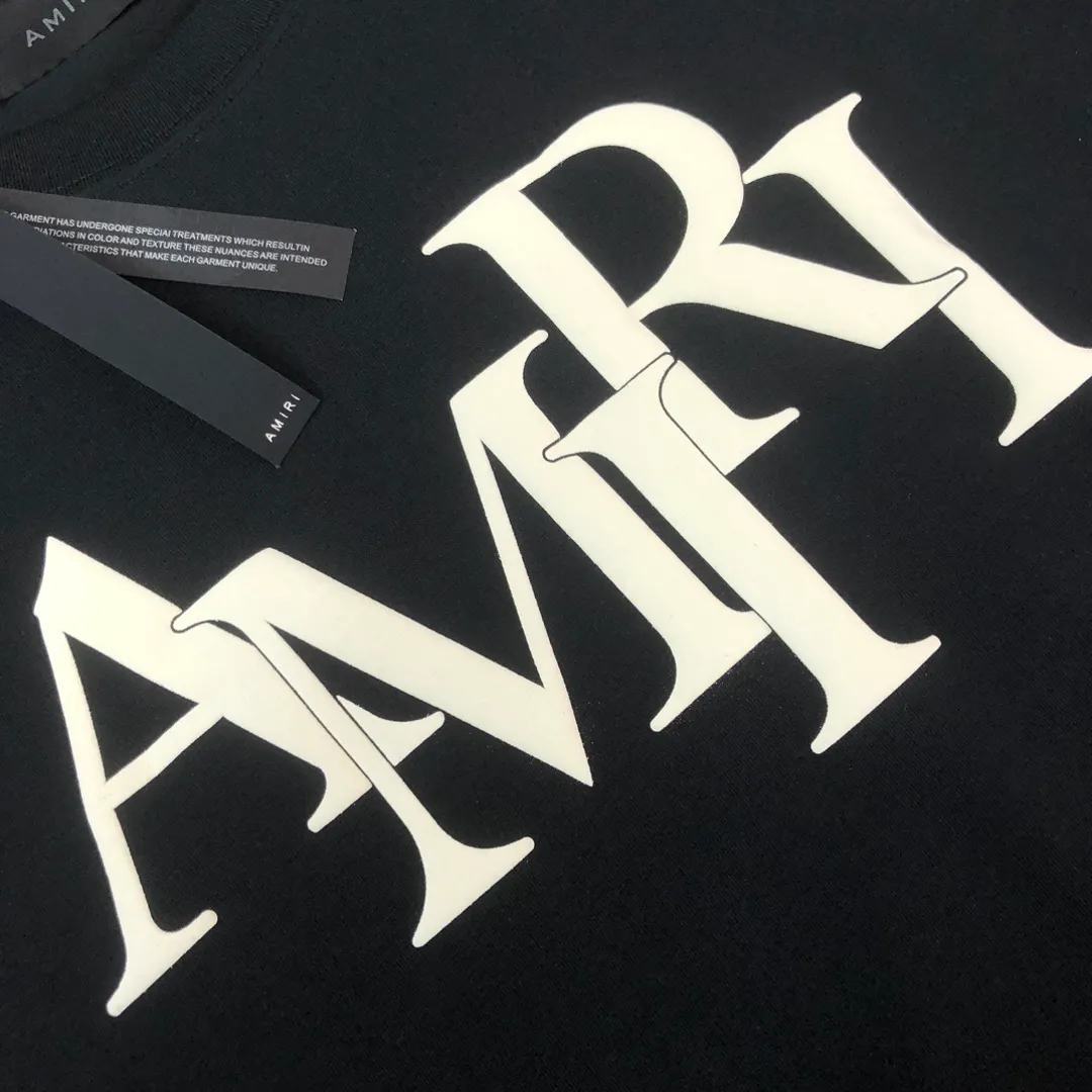 C🌟Amiri 26ss counter Same Style round neck short-sleeved T-shirt ~ Customized suede foam embossed logo craft on the chest! Specially available in custom fabrics! Thick plate three-dimensional! The thicker clothes make the overall breathable and soft texture more prominent, and the full cotton texture makes it extremely comfortable. A must-have item for Premium people, complete with original accessories and accessories! Same Style for men and women! Color: Black White Mint Green Size: XS S M L (larger version! Please state your height and weight when placing an order!)